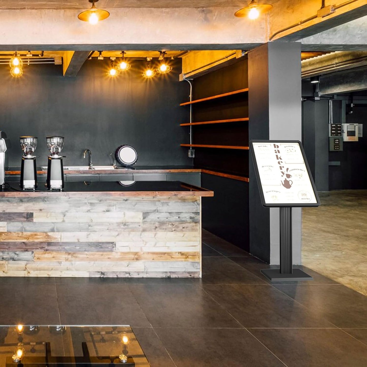 Floor standing sign holder positioned in contemporary coffee shop interior with industrial design, wooden counter and pendant lighting showcasing menu display functionality