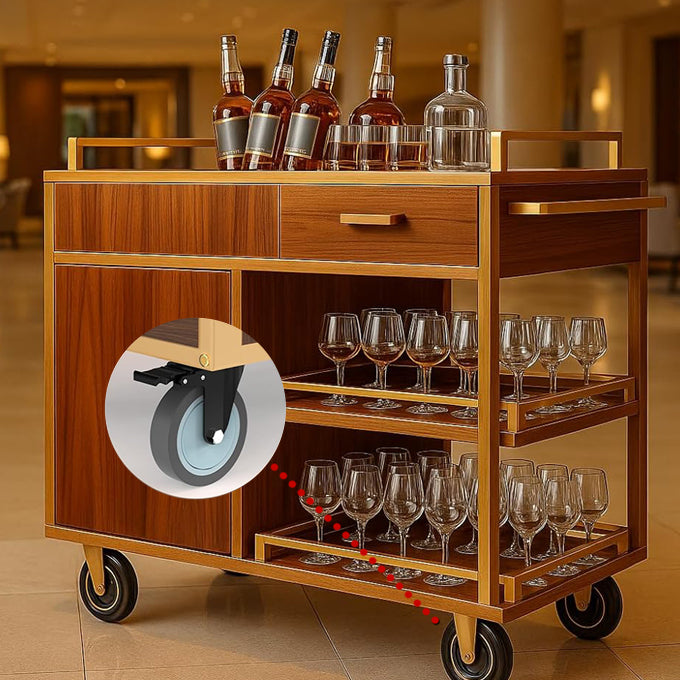 Luxury hotel service cart featuring silent swivel wheels with brake function. Elegant wooden service trolley equipped with four smooth-rolling casters, including two locking wheels for stability. Multi-tier beverage cart with drawer storage, displaying wine bottles and glassware. Professional hospitality trolley with quiet operation and secure positioning capability.