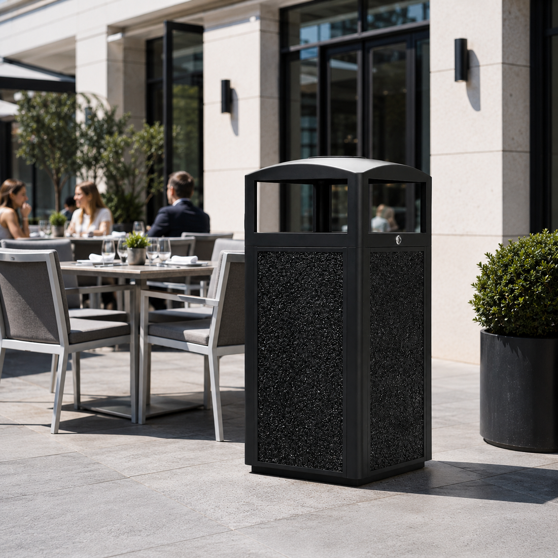 Outdoor trash can placed in a clean luxury hotel patio dining area