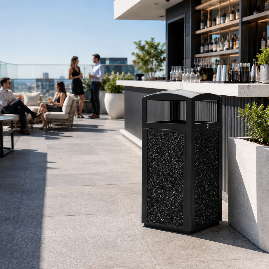 Outdoor trash can placed in a clean luxury hotel rooftop bar