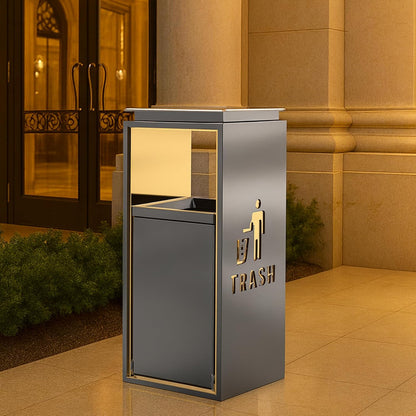 Premium outdoor trash receptacle with golden LED trim positioned outside upscale commercial building with classical stone columns and warm evening lighting