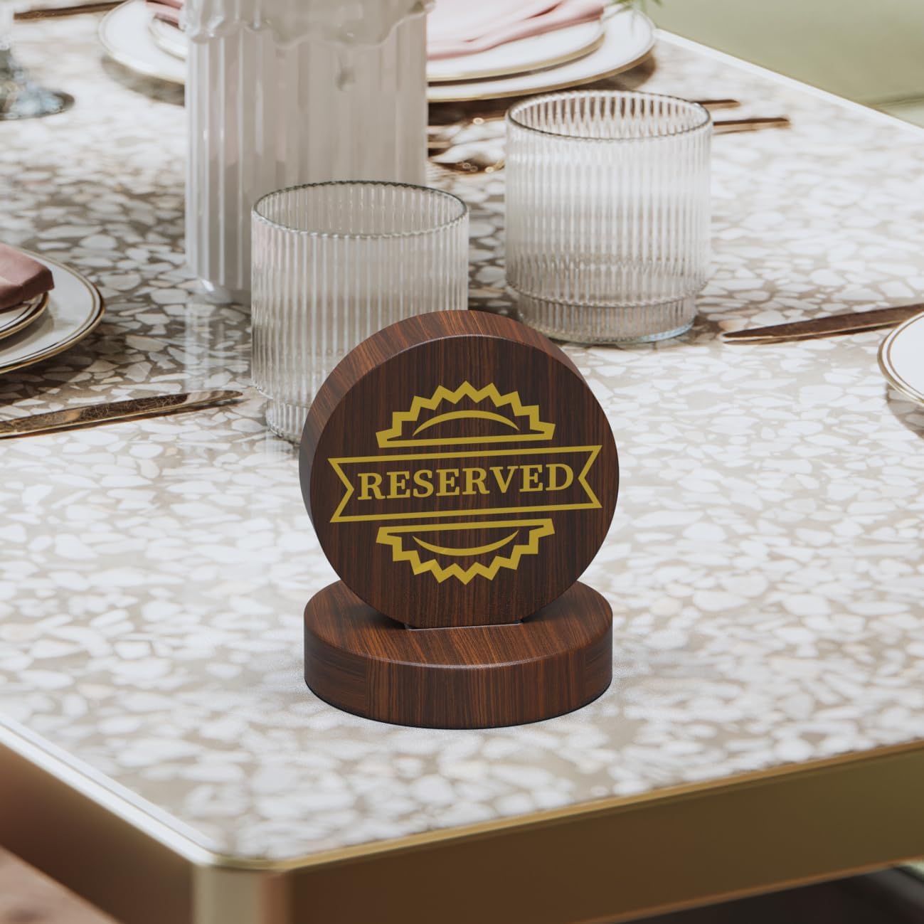 Premium wooden reserved sign on marble table surface with crystal glassware and elegant dining accessories