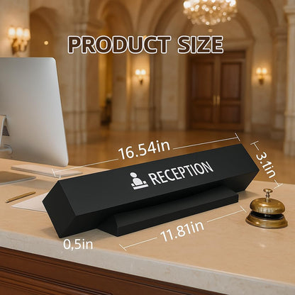 Black reception desk sign with detailed measurements showing 16.54 inch length, 1.3 inch height, positioned on luxury hotel reception desk with service bell