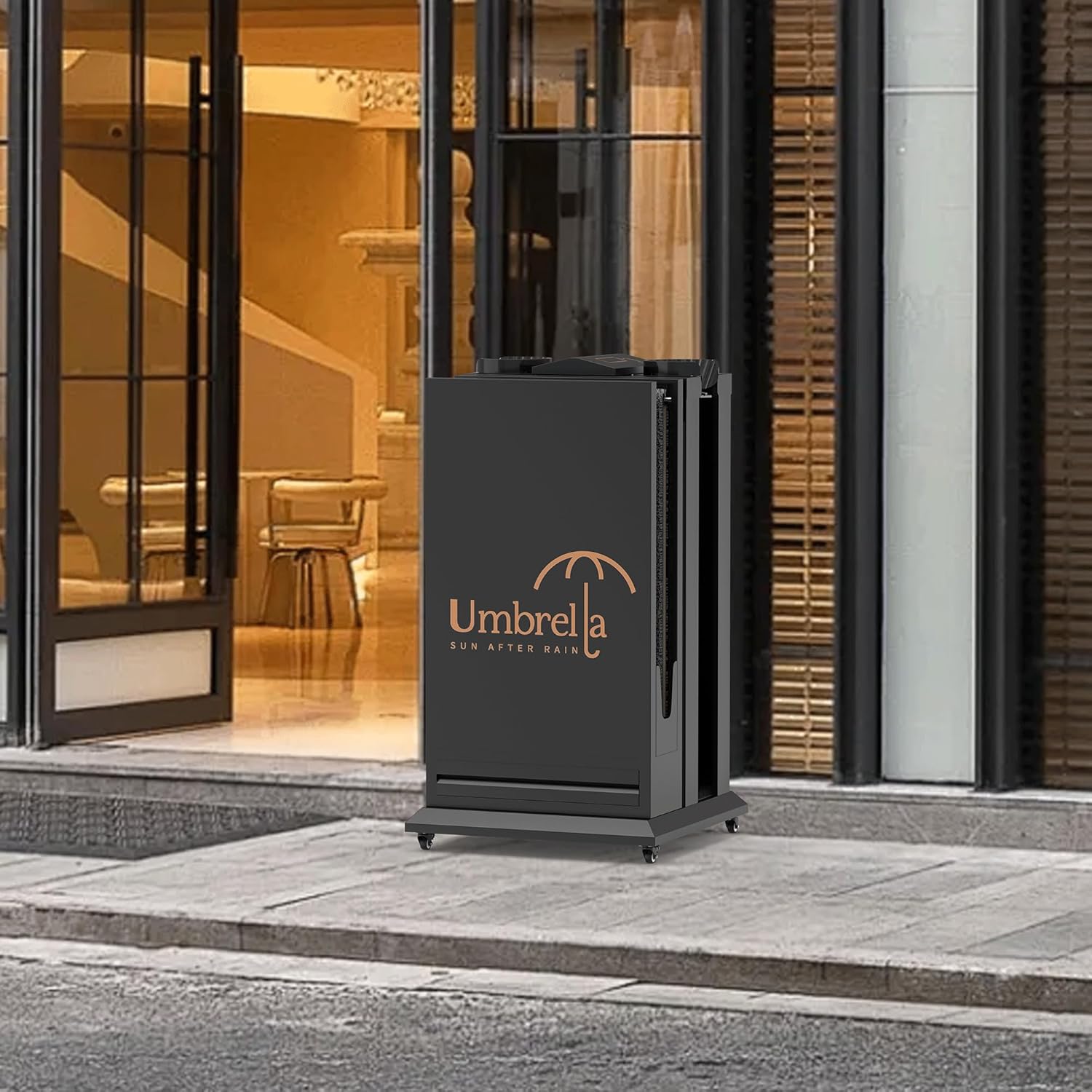 Sleek umbrella bag dispenser positioned at building entrance with glass doors, showing professional installation in contemporary office environment
