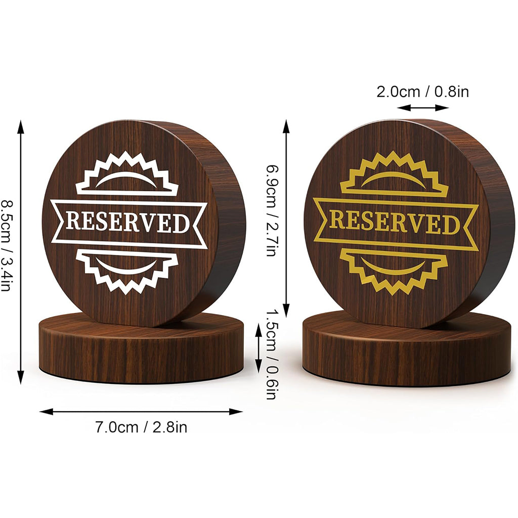 Product dimension comparison showing two wooden reserved table signs with measurements in centimeters and inches
